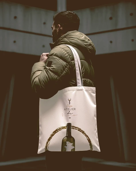Atelier tote bag and bottle, branded packaging carried in the street