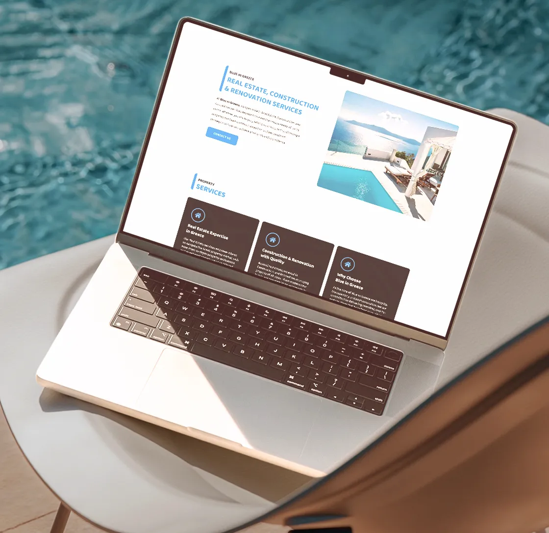 Hotel booking platform on a laptop by a pool