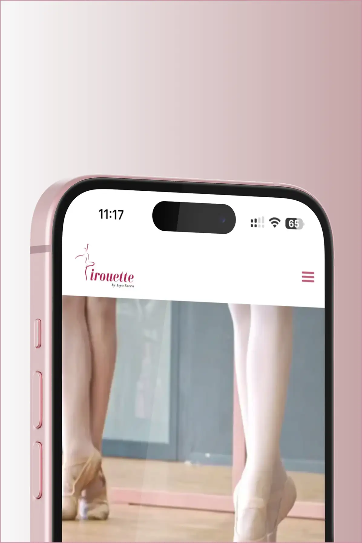 The Pirouette Studio site shown on an iPhone against a dancer in pointe shoes