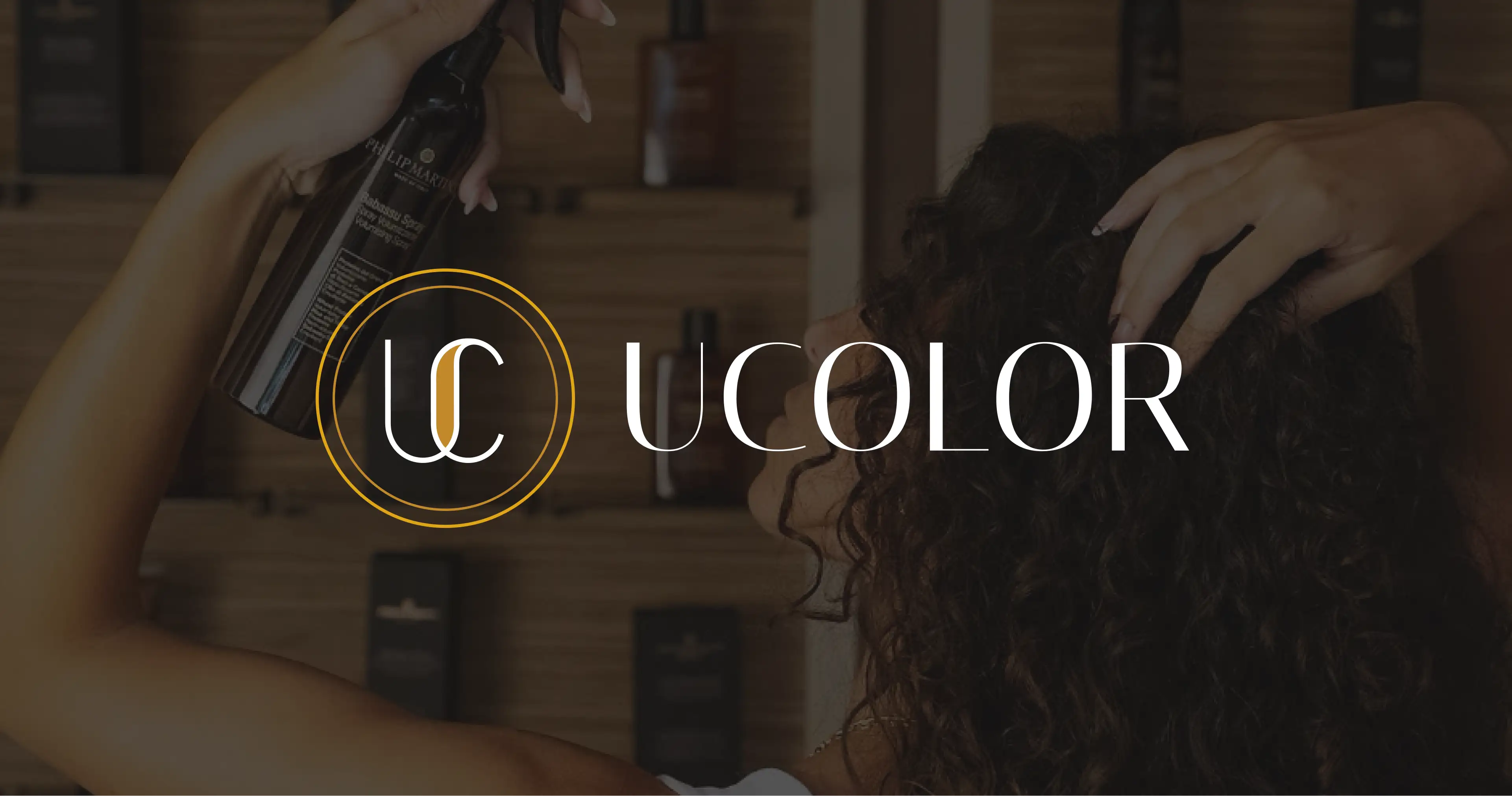 The gold UCOLOR logo set over a portrait, framing the brand identity